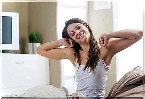 Woman waking up from a good rest