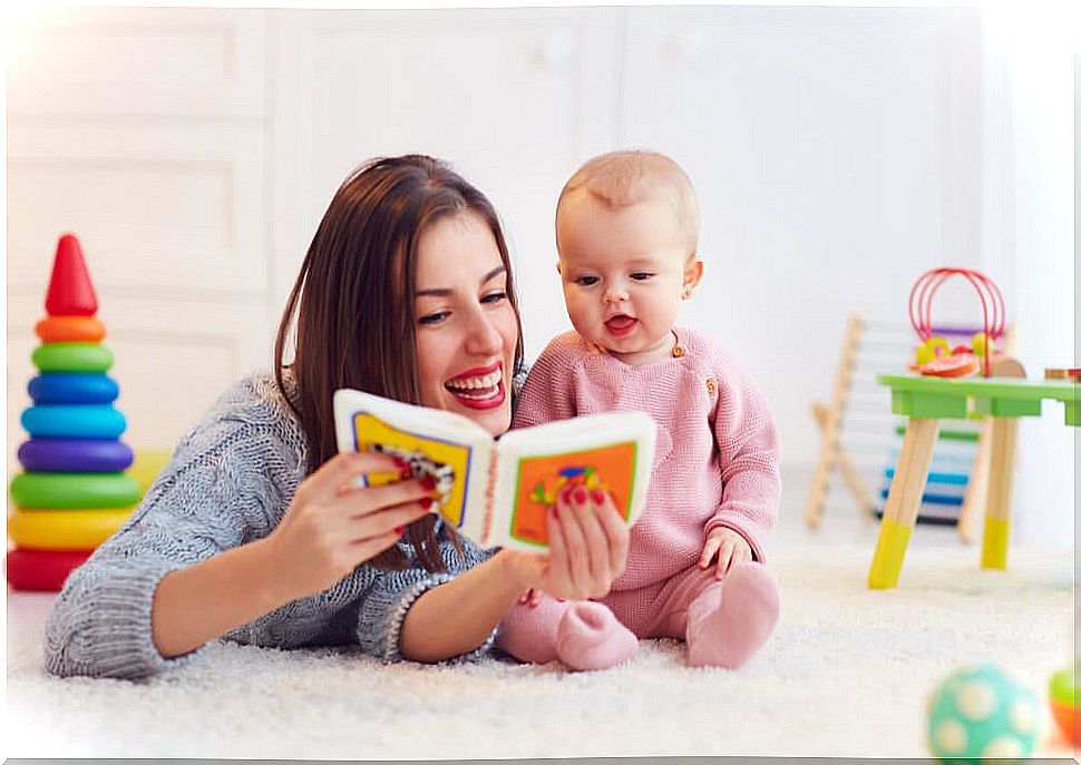 Mother reading a story to the baby.