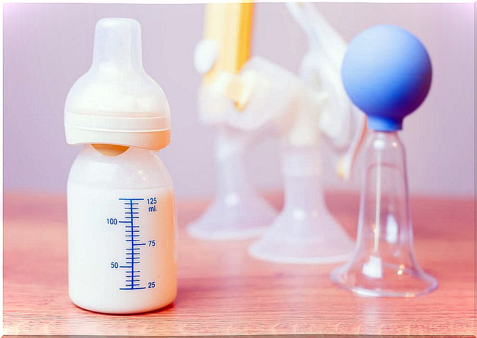 Mix breast milk and formula in the bottle.